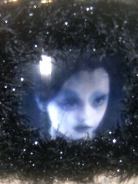 Three Dimensional Moving Picture Handbag With Attached Coin Purse